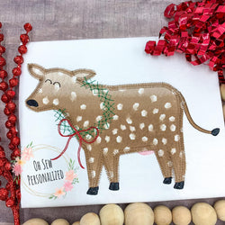 Christmas Cow With Wreath